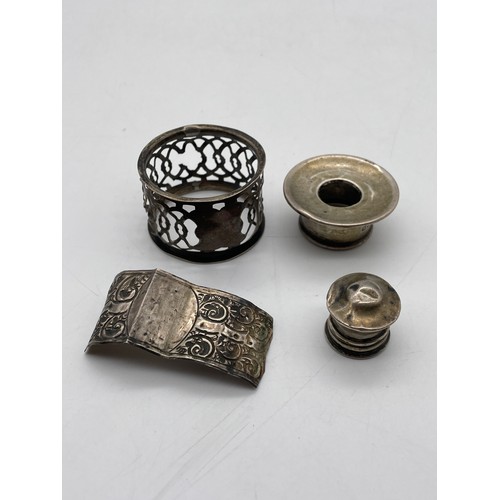 501 - SMALL BAG CONTAINING FOUR ITEMS OF SCRAP SILVER - NAPKIN RING, BOTTLE TOP, ETC