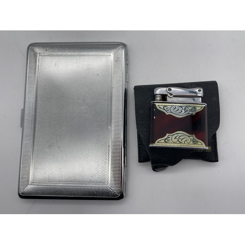 517 - CHROMIUM POCKET CIGARETTE CASE AND A RONSON LIGHTER