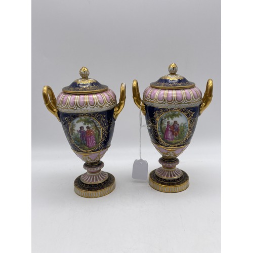 539 - PAIR OF VIENNA OVOID TWIN HANDLED PEDESTAL VASES AND COVERS DECORATED WITH PANELS OF FIGURES ON A BL... 