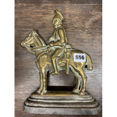 556 - BRASS CAVALRY MAN DOOR STOP