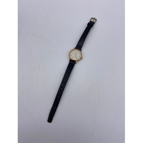 521 - LADIES UNMARKED GARRARD QUARTZ PRESENTATION WATCH ON LEATHER STRAP