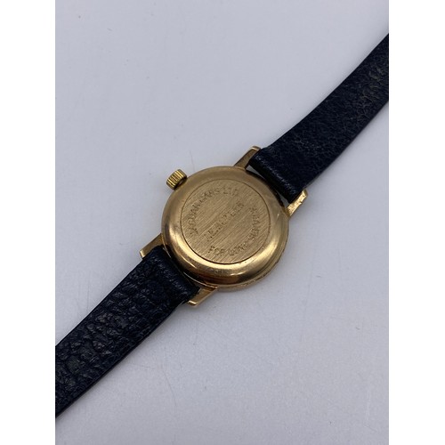 521 - LADIES UNMARKED GARRARD QUARTZ PRESENTATION WATCH ON LEATHER STRAP