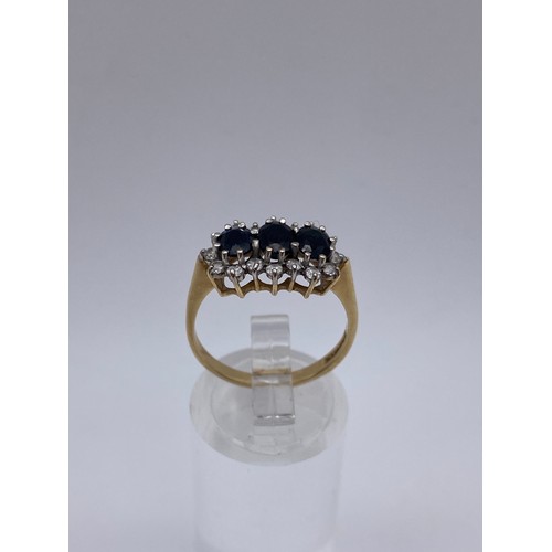 504 - 9CT GOLD CZ AND CHANNEL SET DRESS RING 2.4G APPROX