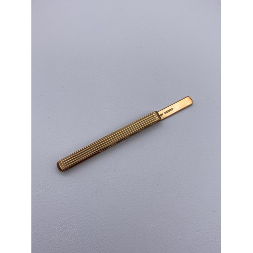 496 - 9CT GOLD TIE SLIDE 7.3G APPROX