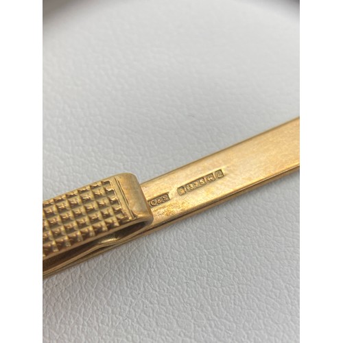 496 - 9CT GOLD TIE SLIDE 7.3G APPROX