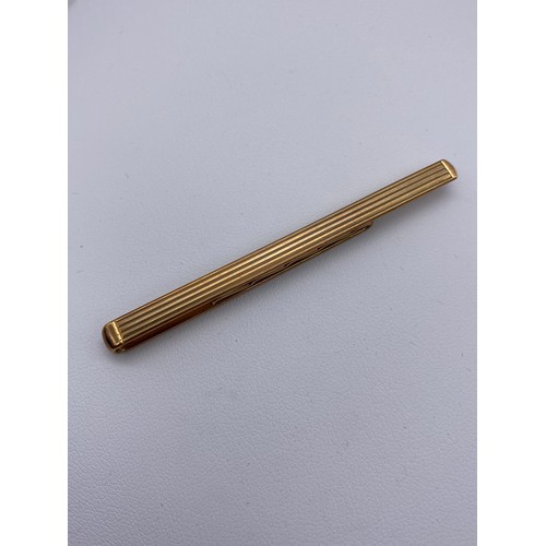 496 - 9CT GOLD TIE SLIDE 7.3G APPROX