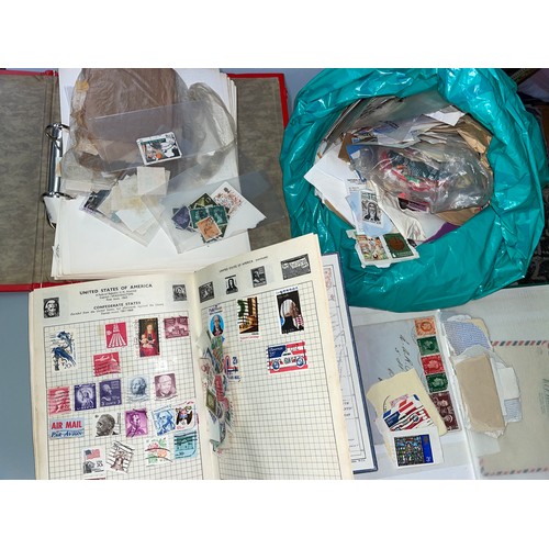 485 - THREE ALBUMS OF WORLD POSTAGE STAMPS AND BAG OF LOOSE FRANKED STAMPS