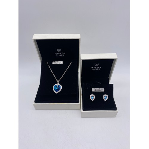 516 - BOXED SWAROVSKI CRYSTAL HEART SHAPED PENDANT ON TRACE CHAIN AND MATCHING EARRINGS