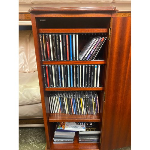 60 - YEW WOOD CROSS BANDED FAUX FRONT CD STORAGE CABINET CONTAINING CDS AND SOME DVDS