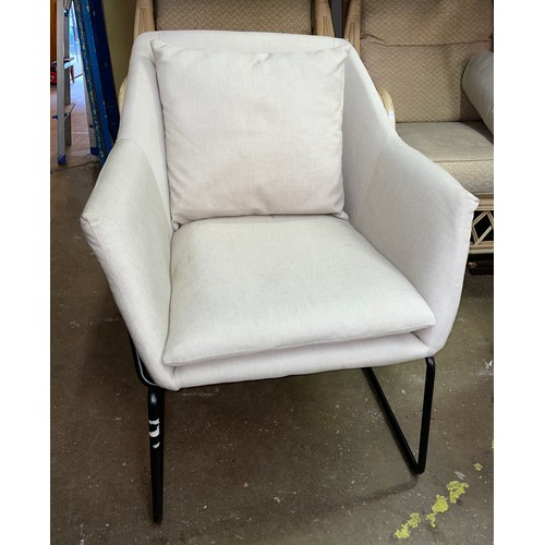 29 - GREY CANVAS AND TUBULAR FRAMED EASY CHAIR WITH BOLSTER CUSHION