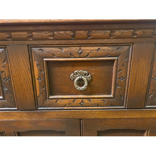 81 - OLD CHARM OAK CARVED MEDIA CABINET