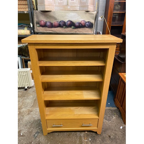 74 - GOOD QUALITY OAK DWARF BOOKCASE WITH SINGLE BASE DRAWER