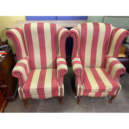 73 - PAIR OF RED AND OATMEAL STRIPED HIGH WING BACK ARMCHAIRS