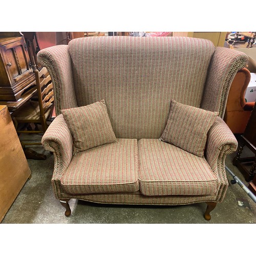 72 - RED AND BROWN CHEQUERED HIGH WING BACK TWO SEATER SOFA ON CABRIOLE LEGS