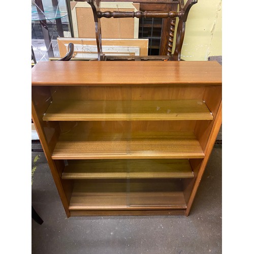 24 - GIBBS TEAK GLAZED SLIDING DOOR BOOKCASE