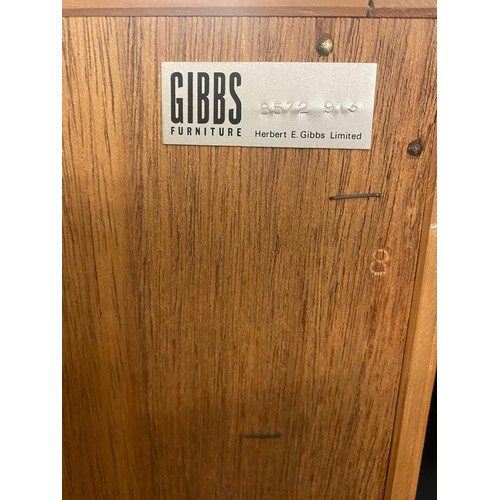 24 - GIBBS TEAK GLAZED SLIDING DOOR BOOKCASE