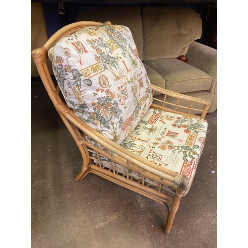 69 - PAIR OF BAMBOO FLORAL CUSHION CONSERVATORY ARMCHAIRS