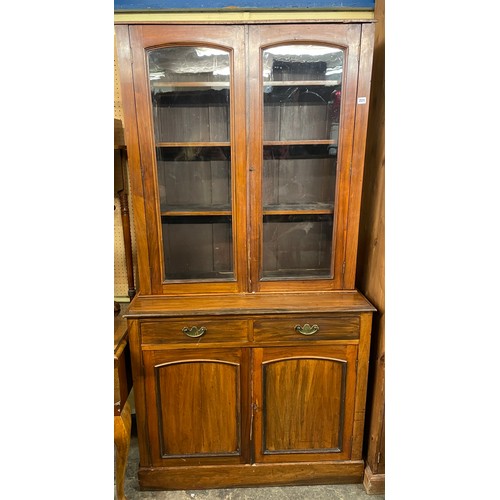 144 - LATE VICTORIAN WALNUT GLAZED BOOKCASE CUPBOARD