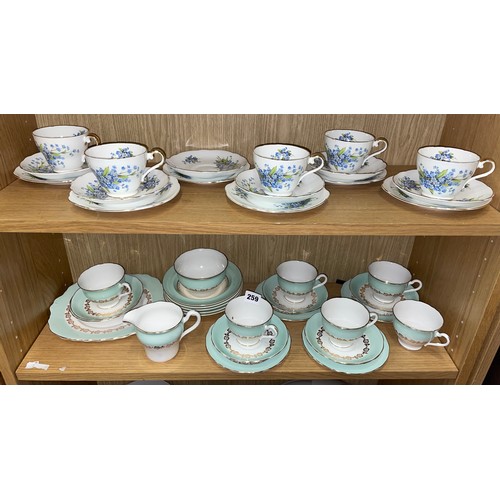 205 - TURQUOISE GILT TEASET AND PART TEASET