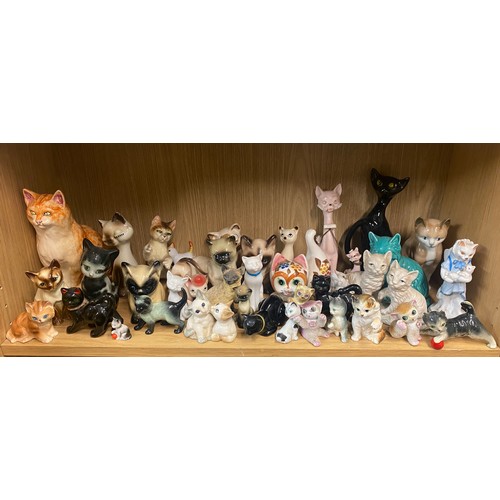 199 - SHELF OF PORCELAIN AND CERAMIC CATS INCLUDING VICTORIAN SPILL HOLDER, AVON NOVELTY SCENT BOTTLES