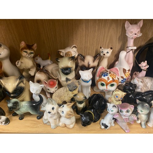 199 - SHELF OF PORCELAIN AND CERAMIC CATS INCLUDING VICTORIAN SPILL HOLDER, AVON NOVELTY SCENT BOTTLES