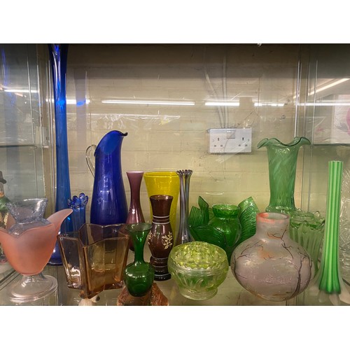 238 - SHELF OF VINTAGE COLOURED GLASSWARE INCLUDING VASES, SPILL VASES, HANDKERCHIEF GLASS, ETC