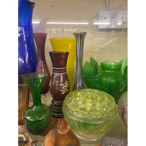 238 - SHELF OF VINTAGE COLOURED GLASSWARE INCLUDING VASES, SPILL VASES, HANDKERCHIEF GLASS, ETC