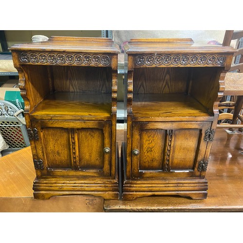 157 - PAIR OF GOOD QUALITY OAK BEDSIDE CABINETS WITH CARVED ROSE DECORATION