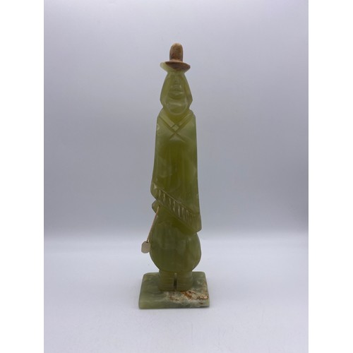 504 - CARVED ONYX FIGURE OF GENTLEMAN WITH A HAT 32CM H