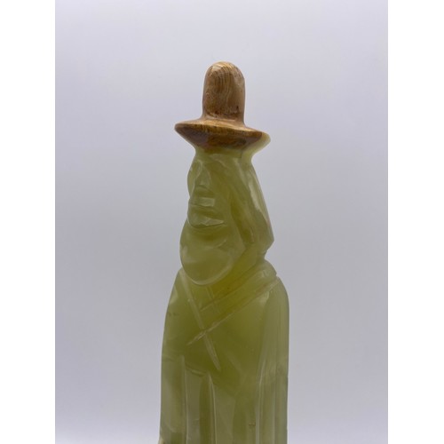 504 - CARVED ONYX FIGURE OF GENTLEMAN WITH A HAT 32CM H