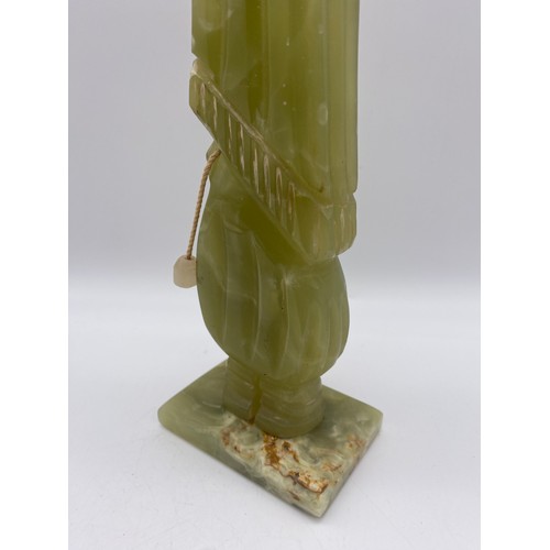 504 - CARVED ONYX FIGURE OF GENTLEMAN WITH A HAT 32CM H