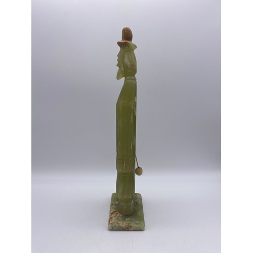 504 - CARVED ONYX FIGURE OF GENTLEMAN WITH A HAT 32CM H