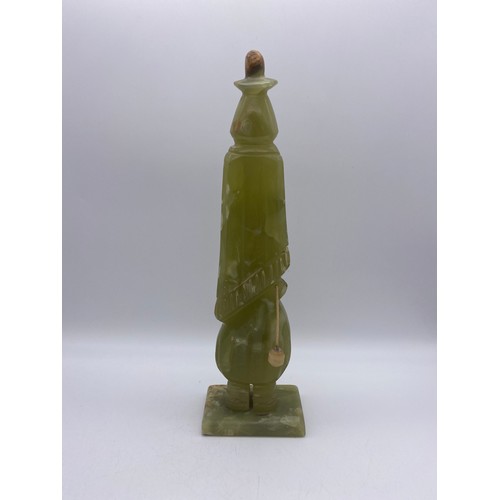 504 - CARVED ONYX FIGURE OF GENTLEMAN WITH A HAT 32CM H