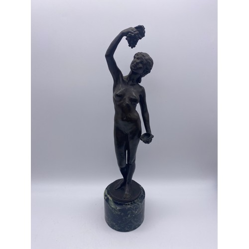 415 - EVA BENSON (AUSTRALIAN) BRONZE CLASSICAL FEMALE FIGURE WITH GRAPES ON MARBLE SOCLE 37CM H