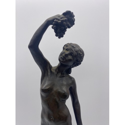 415 - EVA BENSON (AUSTRALIAN) BRONZE CLASSICAL FEMALE FIGURE WITH GRAPES ON MARBLE SOCLE 37CM H