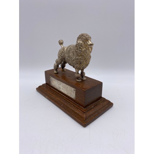 405 - CAST METAL POODLE TROPHY AND TWO ALUMINIUM DOG FIGURES