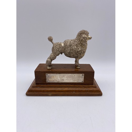 405 - CAST METAL POODLE TROPHY AND TWO ALUMINIUM DOG FIGURES