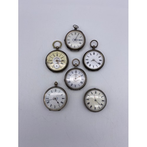 379 - SIX SILVER AND WHITE METAL FOB WATCHES