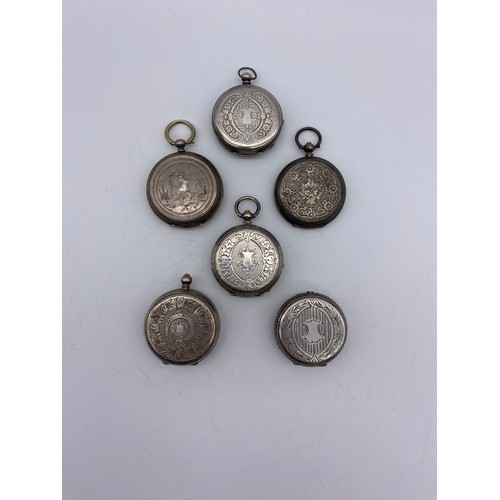 379 - SIX SILVER AND WHITE METAL FOB WATCHES