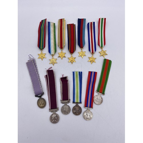 390 - BAG OF MILITARY DRESS MINIATURE MEDALS AND RIBBONS