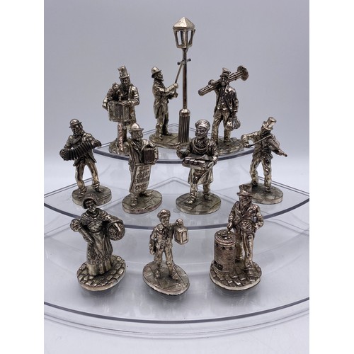 477 - TEN PEWTER CAST MODELS OF DICKENSIAN FIGURES INCLUDING LAMP LIGHTERS, STREET VENDORS BY ROYAL HAMPSH... 