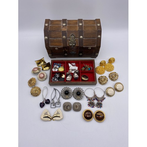 457 - WOODEN JEWELLERY BOX CONTAINING MAINLY CLIP ON EARRINGS AND OTHERS