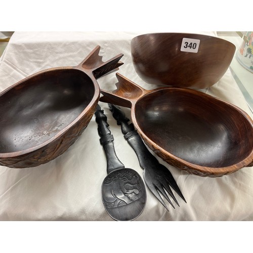 340 - TREEN AND DUG OUT BOWLS AND CARVED WOODEN SERVERS