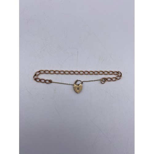 449 - ROSE GOLD BRACELET WITH A YELLOW GOLD HEART PADLOCK AND SAFETY CHAIN 8.8G APPROX