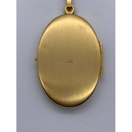 446 - 9CT GOLD OVAL TREE DESIGN LOCKET 5.3G APPROX