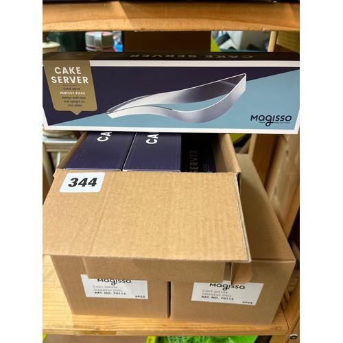 344 - THREE BOXES OF SIX (18) MAGISSO STAINLESS STEEL CAKE SERVERS