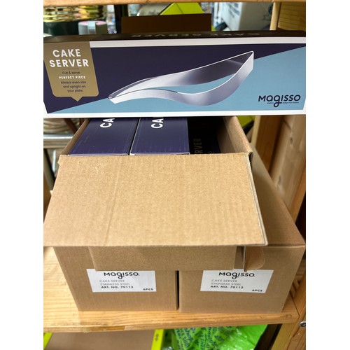 343 - THREE BOXES OF SIX (18) MAGISSO STAINLESS STEEL CAKE SERVERS