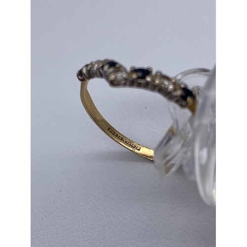 460 - 9CT GOLD SAPPHIRE AND CZ WISHBONE RING SIZE M/N 1.1G