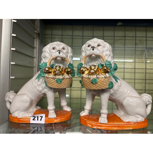 217 - PAIR OF GERMAN MANTLE DOGS WITH BASKETS