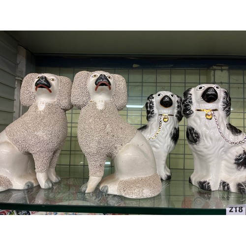 218 - TWO PAIRS OF STAFFORDSHIRE DOGS